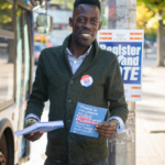 Man promoting voter registration in New York
