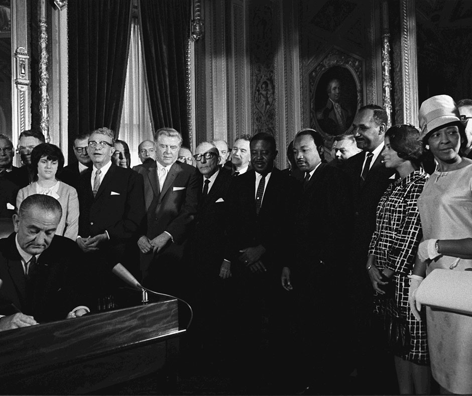 black and white photo of signing of voting rights act