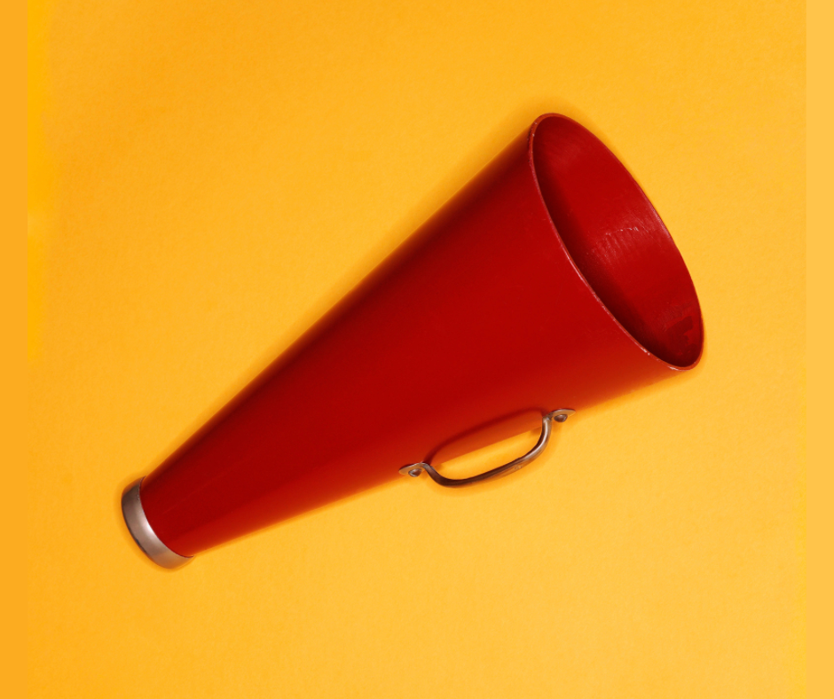 red bullhorn on yellow background